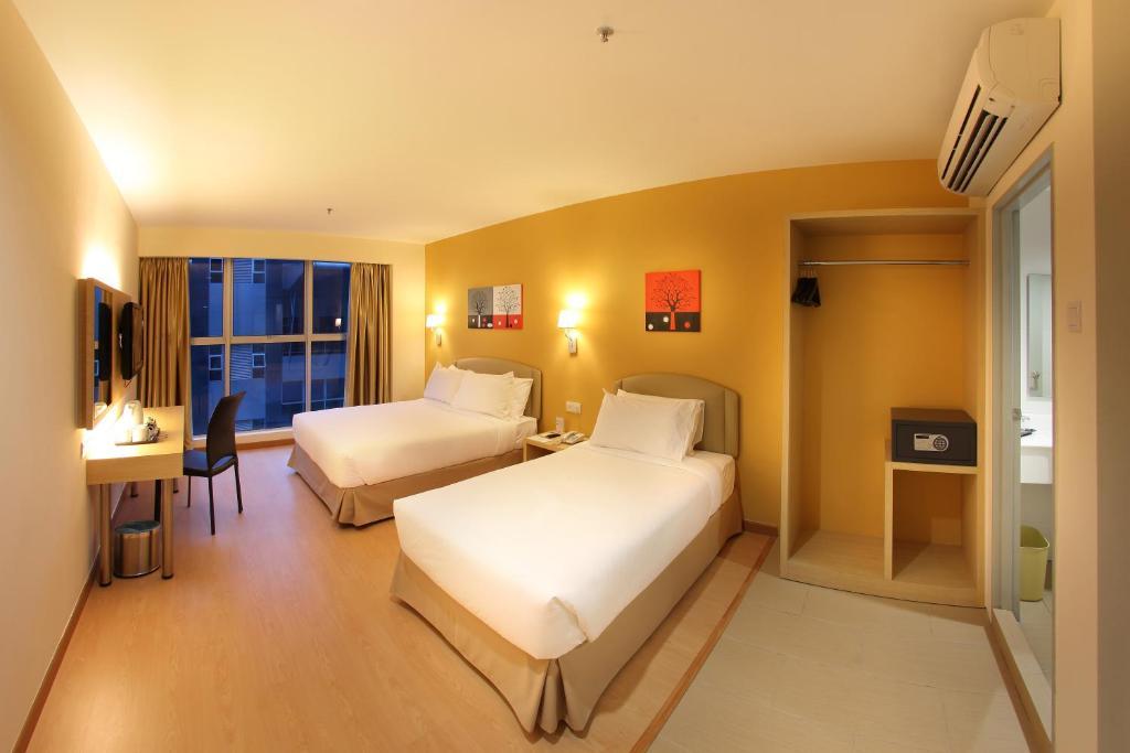Hotel Min Cott Куала-Лумпур Номер фото